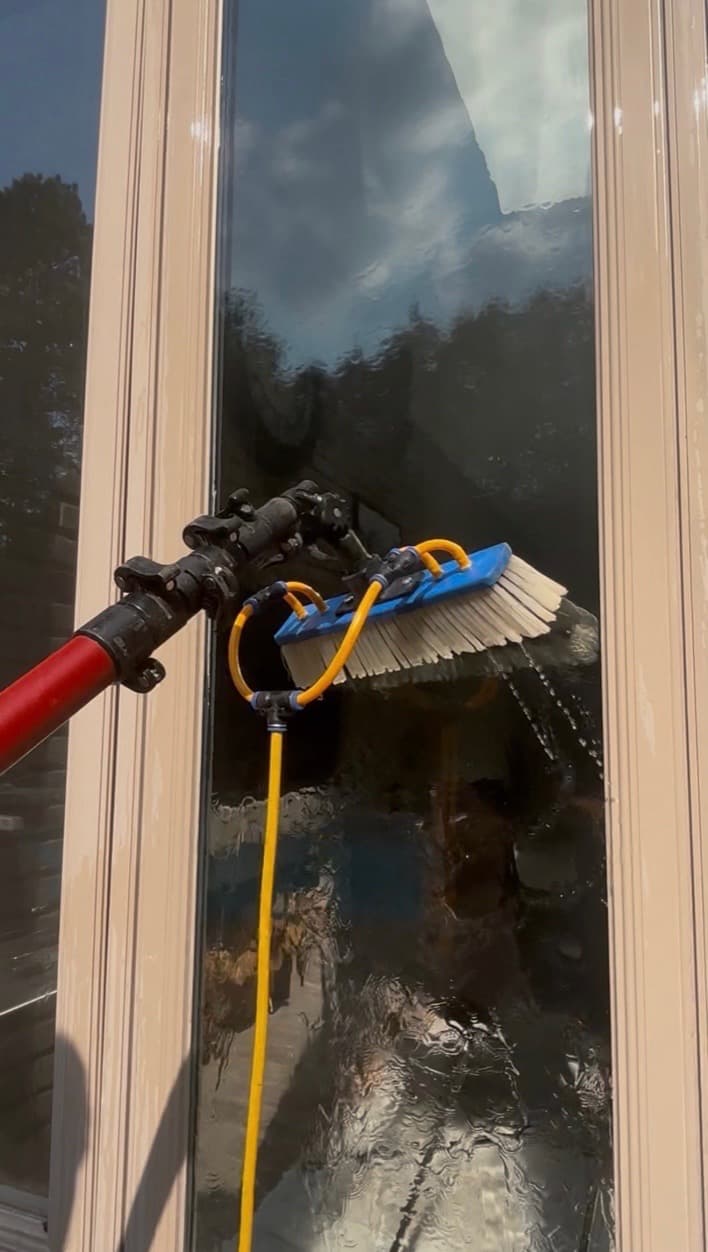 Window cleaned with a professional squeegee